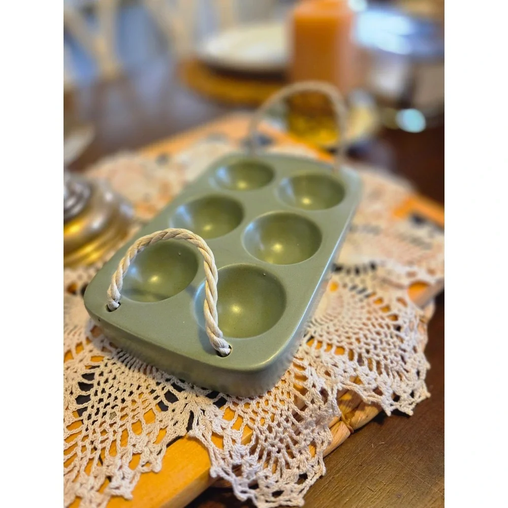 sage green ceramic earthenware egg holder with rope handles